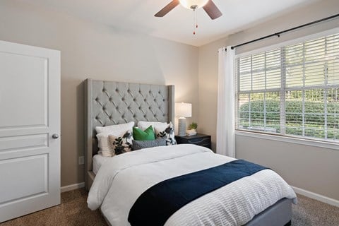 Guest bedroom with bed at The Berkeley Apartments, Georgia, 30096